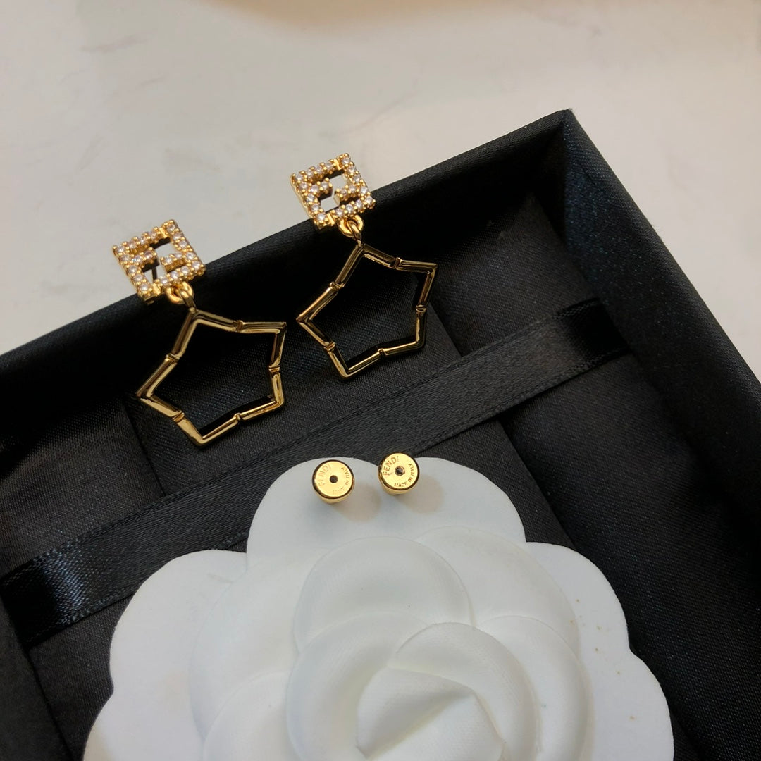 FENDI 26S FF CRYSTAL STAR DROP EARRINGS IN GOLD TONE METAL 622647