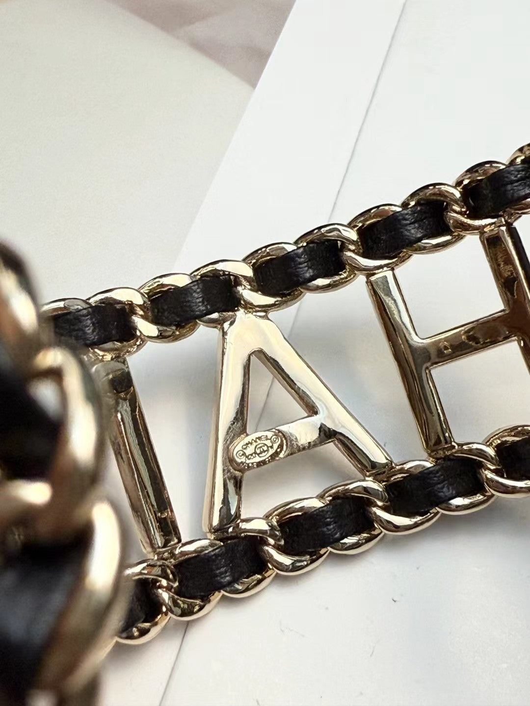 CHANEL 26S CHANEL LOGO OPEN CUFF LEATHER CHAIN BRACELET IN GOLD METAL 630836