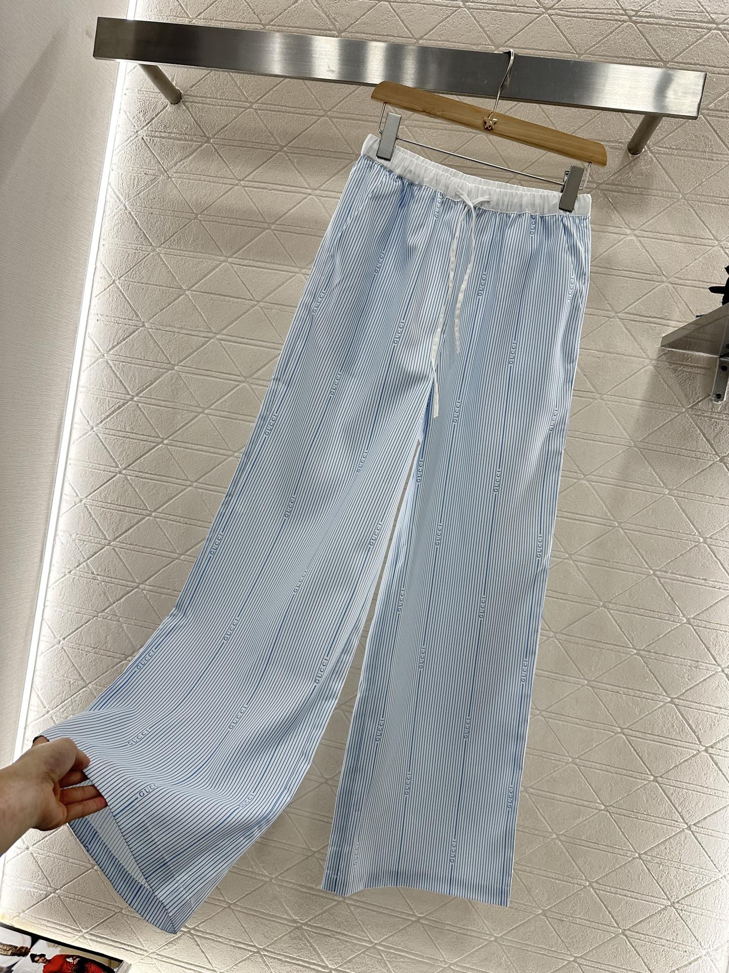 GUCCI STRIPED WIDE-LEG PANTS 276516