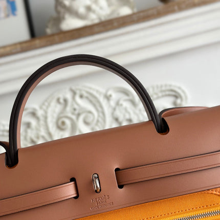 ZIP CABINE 31 BAG IN APRICOT ORANGE CANVAS AND BRONZE BROWN CALFSKIN