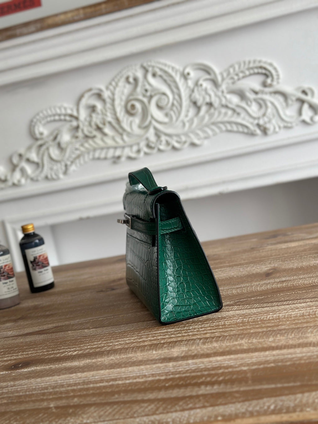 HM 25S KELLY MINI 22 CM IN DARK GREEN LAMBSKIN WITH CROCODILE EMBOSSING AND SILVER HARDWARE