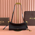 ALAIA 26S LE CLICK BAG 25 IN BROWN NEAR BLACK CALFSKIN