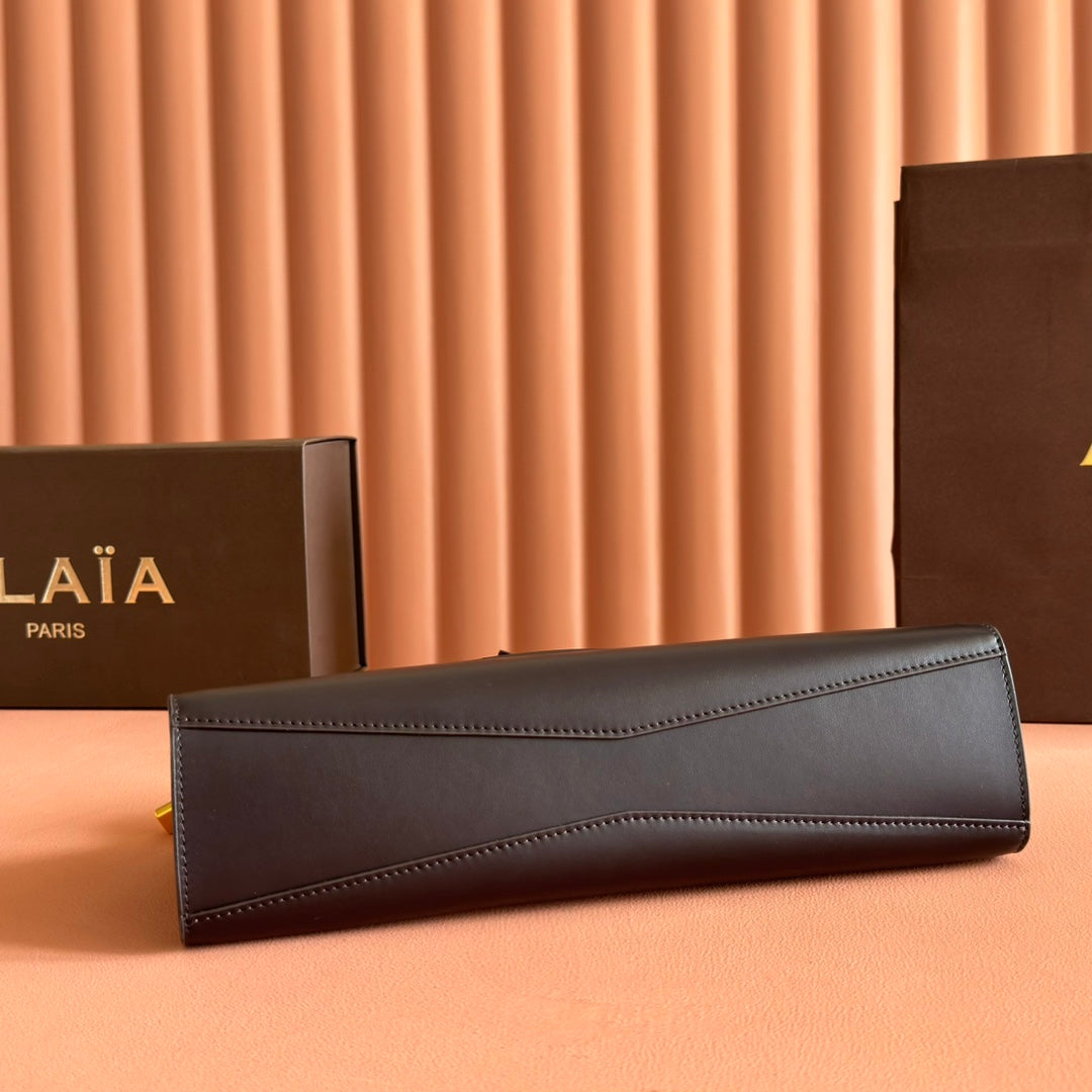 ALAIA 26S LE CLICK BAG 30 IN BROWN NEAR BLACK CALFSKIN