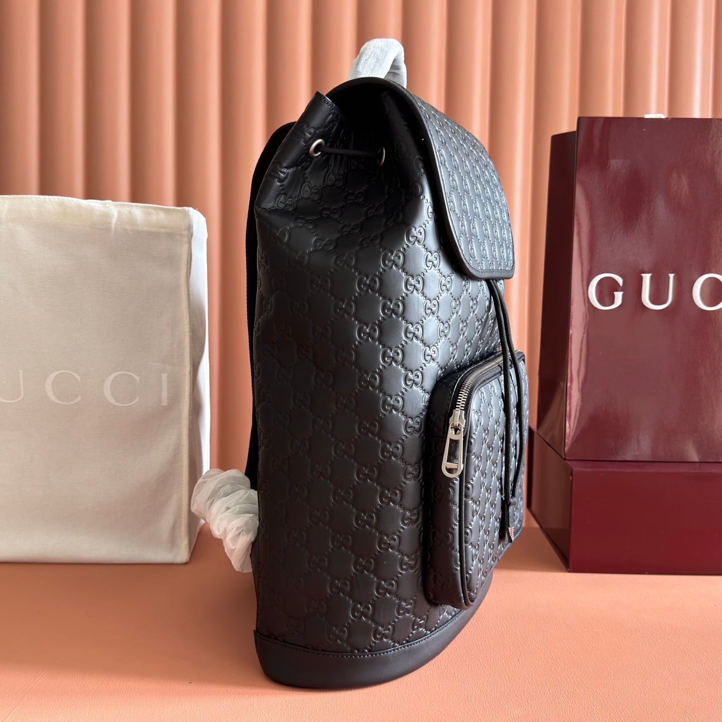 GUCCI 26S GG EMBLEM BACKPACK 44 IN BLACK EMBOSSED CALFSKIN