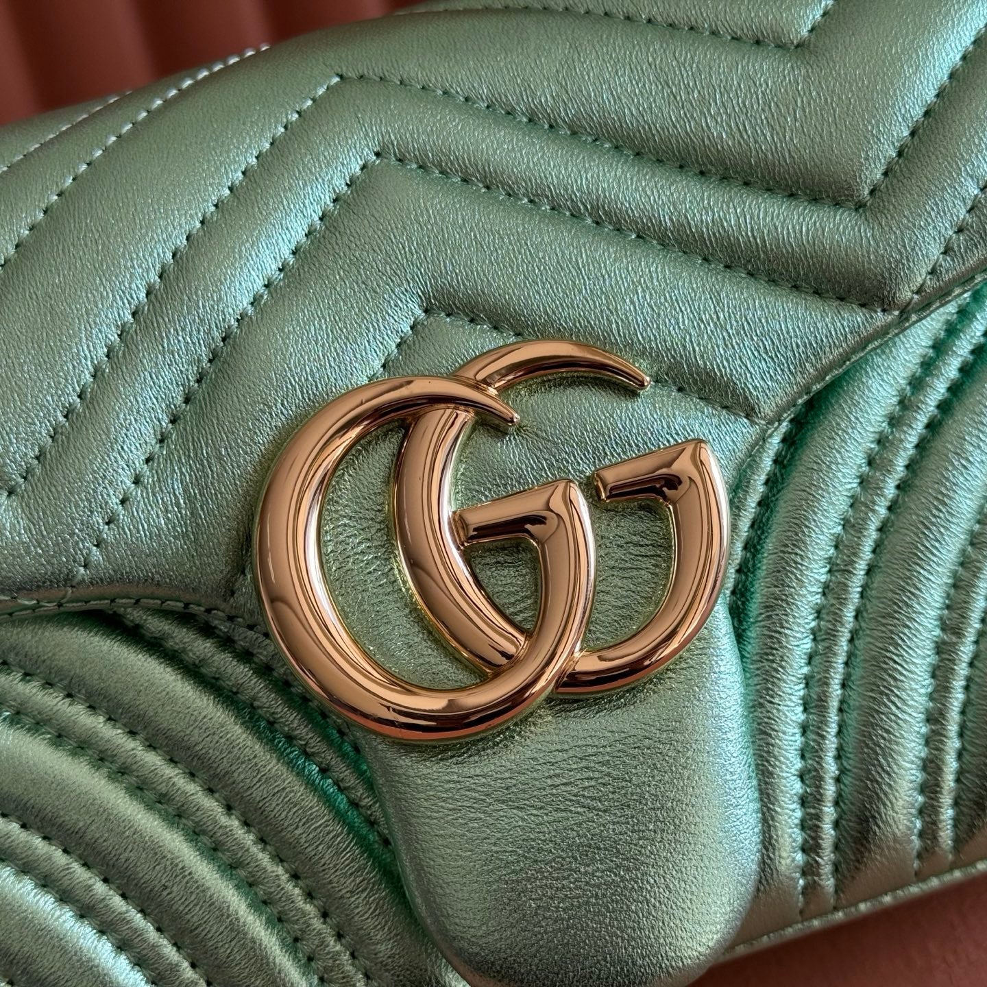 GUCCI 26S GG MARMONT BAG 26 IN METALLIC PALE GREEN LAMBSKIN