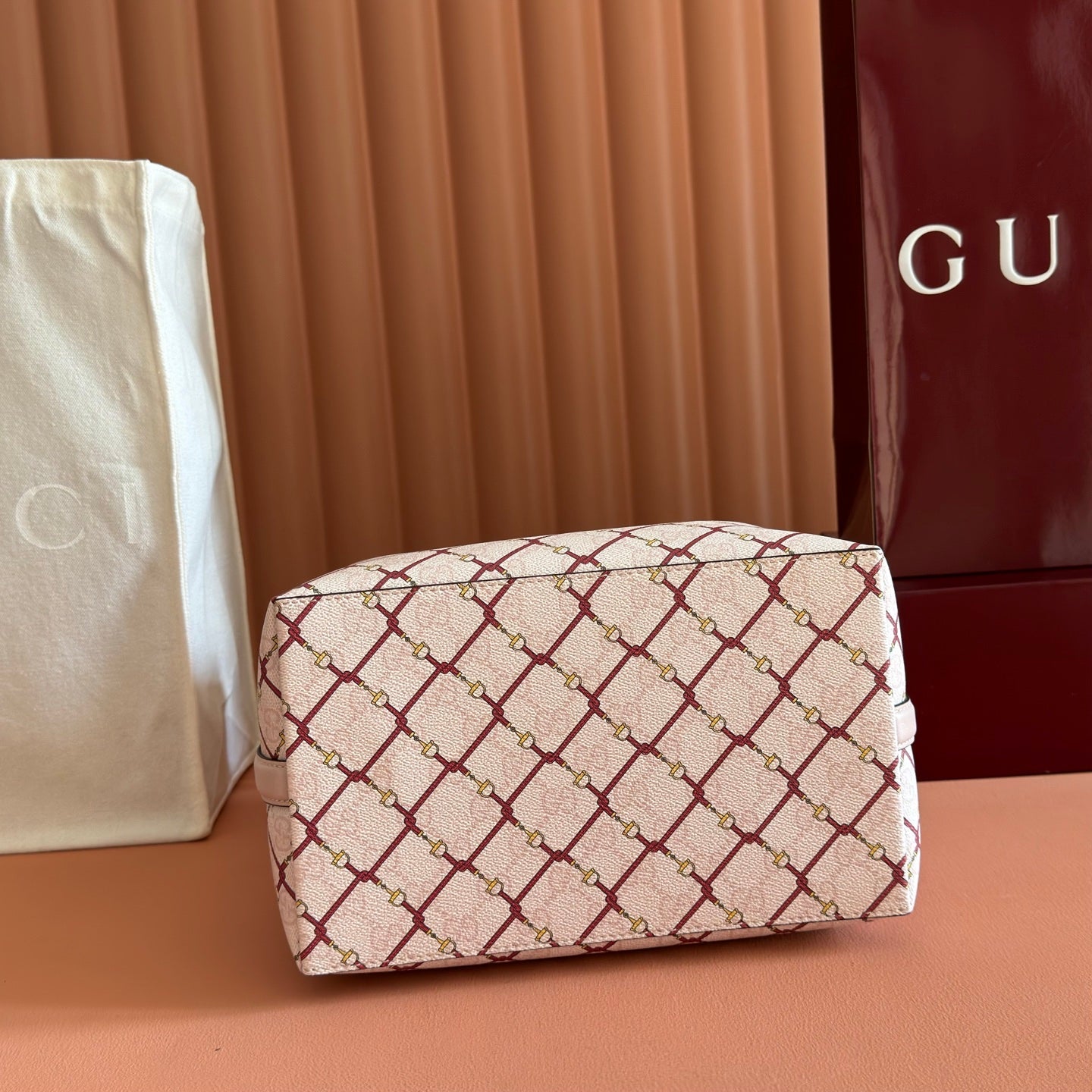 GUCCI 26S GG EMBLEM BUCKET BAG 25 IN LIGHT PINK COATED FABRIC