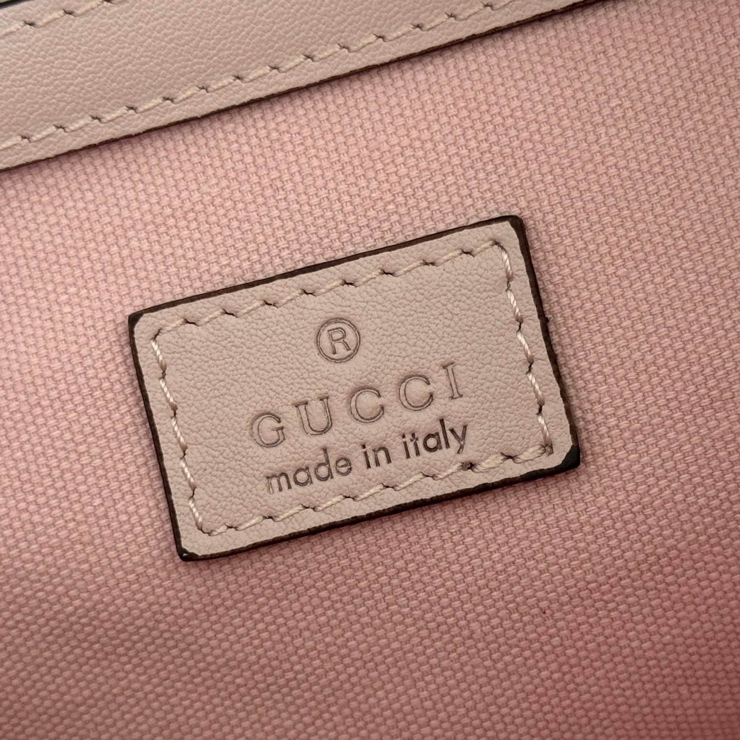 GUCCI 26S GG EMBLEM BUCKET BAG 25 IN LIGHT PINK COATED FABRIC