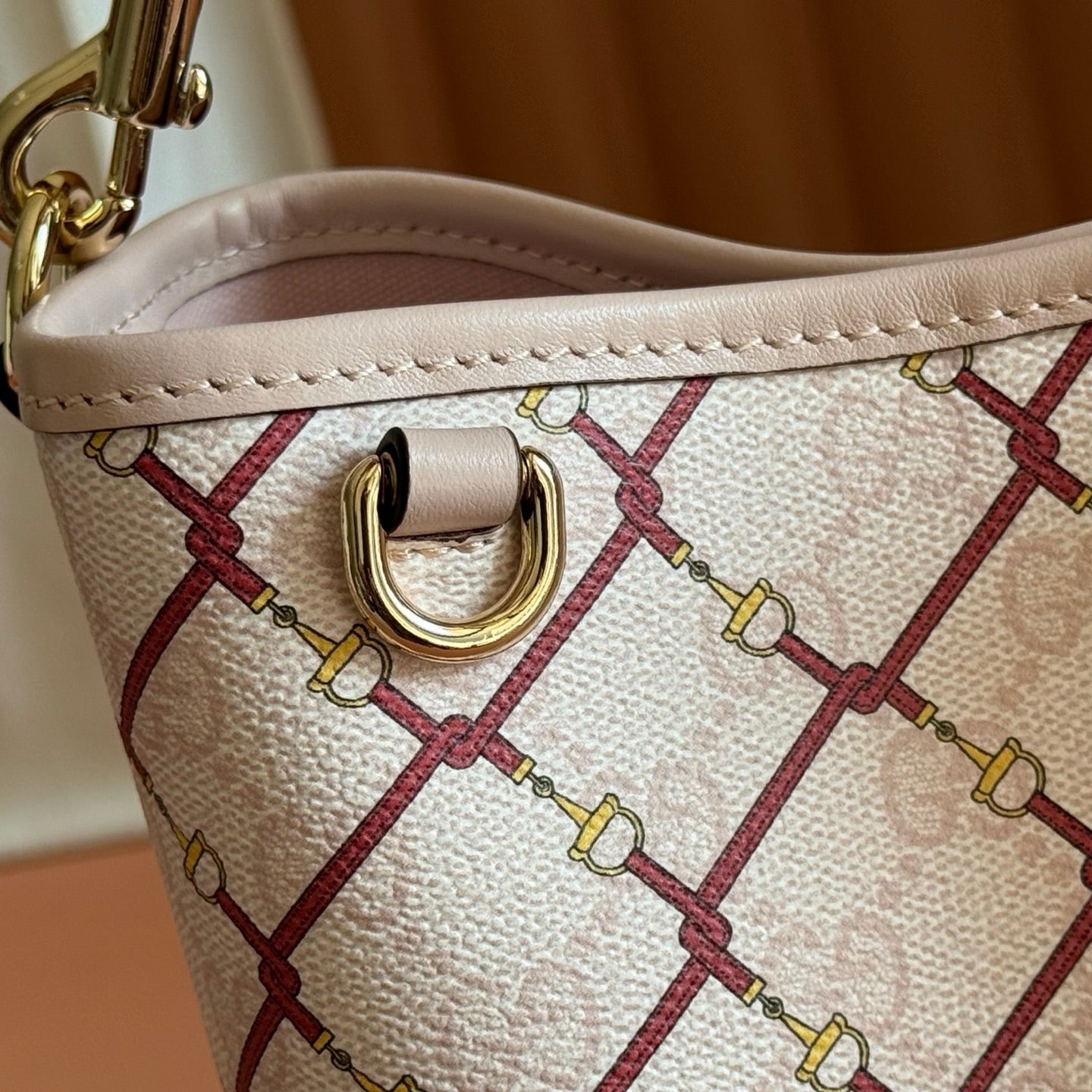 GUCCI 26S GG EMBLEM BUCKET BAG 19 IN LIGHT PINK COATED FABRIC