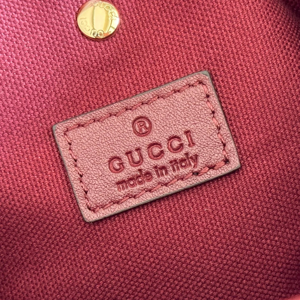 GUCCI 26S GG EMBLEM BUCKET BAG 19 IN DARK RED COATED FABRIC