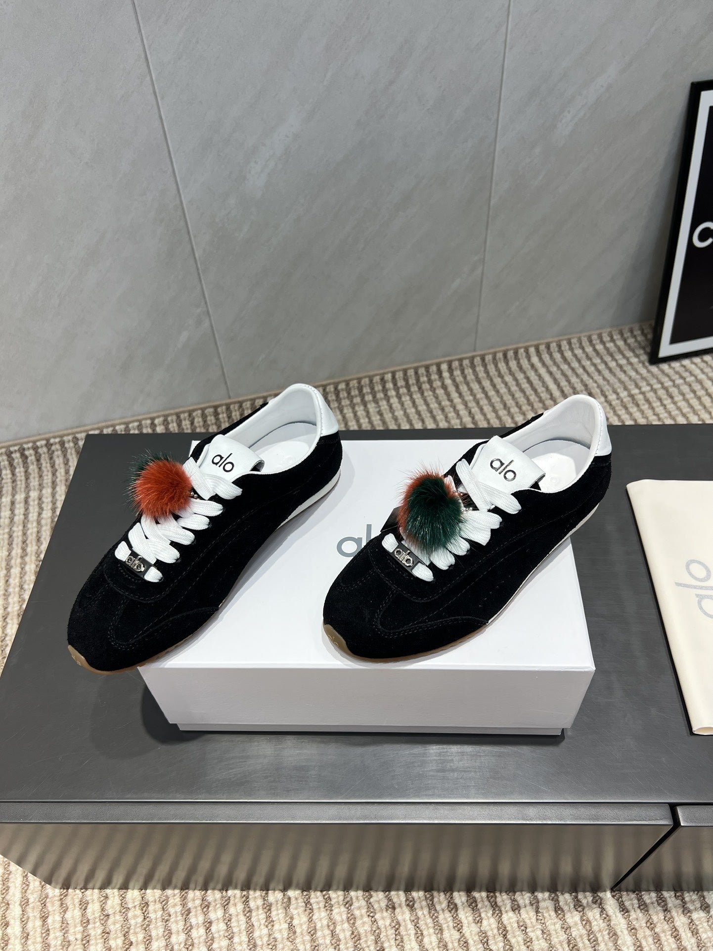 ALO 25S SUNSET SNEAKER IN BLACK SUEDE WITH PUFF CHARM