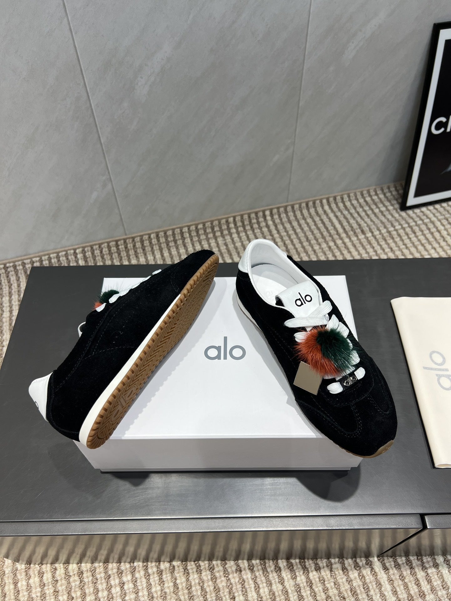 ALO 25S SUNSET SNEAKER IN BLACK SUEDE WITH PUFF CHARM