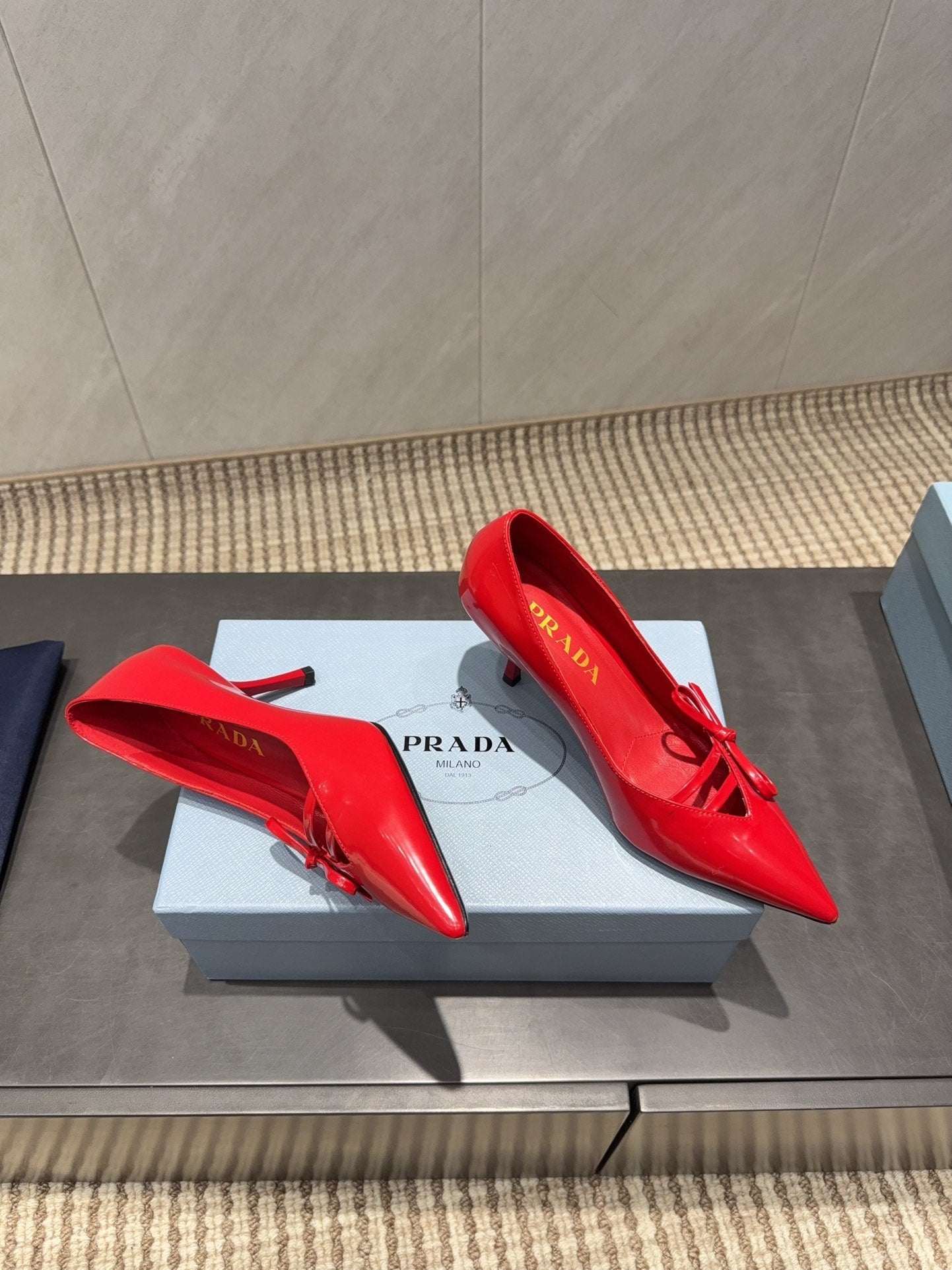 PRADA 26S POINTED TOE HEELS 75MM IN DARK RED CALFSKIN WITH BOW