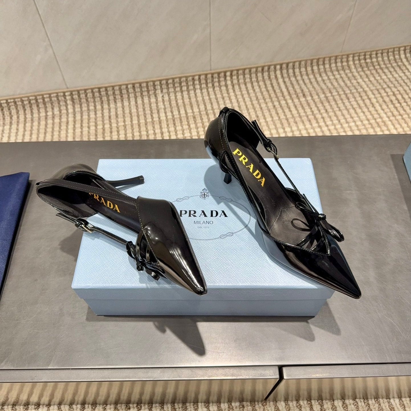 PRADA 26S POINTED TOE CUT OUT HIGH HEELS 75MM IN BLACK CALFSKIN WITH BOW