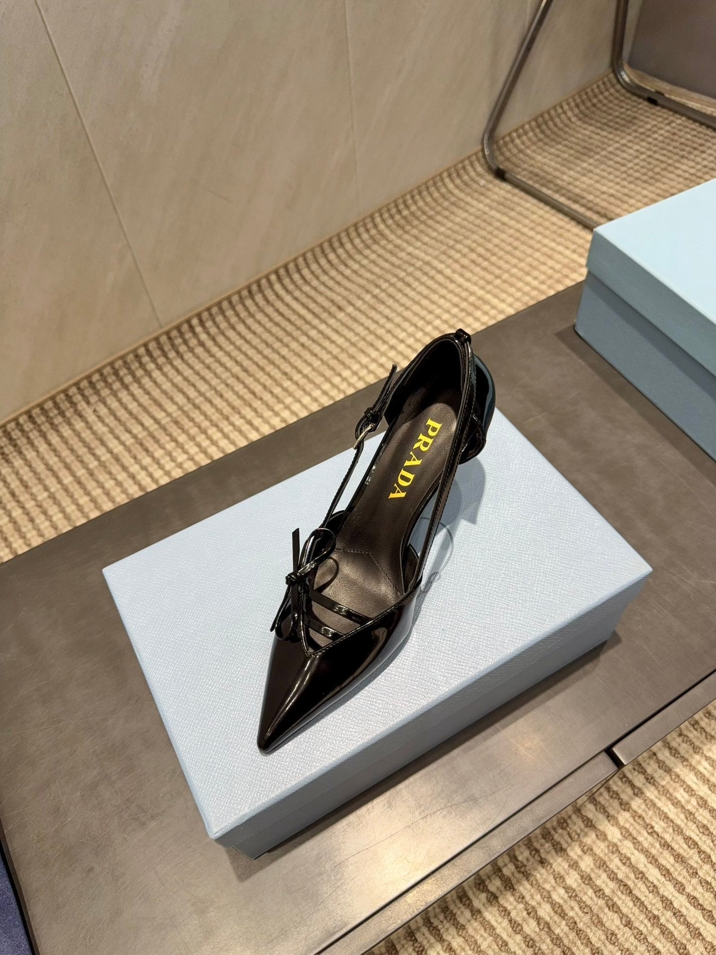 PRADA 26S POINTED TOE CUT OUT HIGH HEELS 75MM IN BLACK CALFSKIN WITH BOW