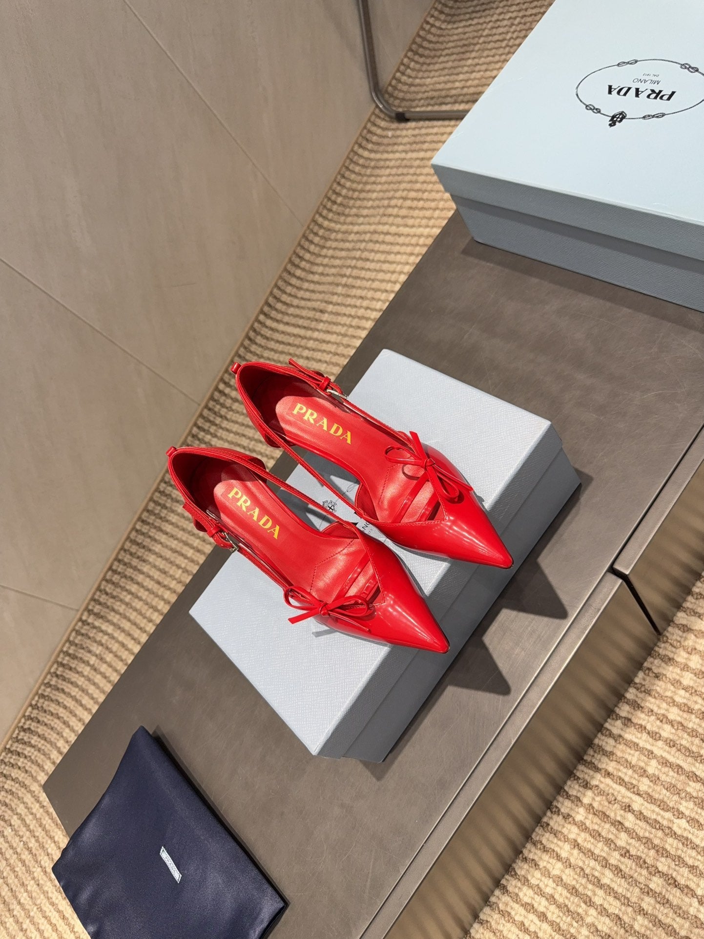 PRADA 26S POINTED TOE CUT OUT HIGH HEELS 75MM IN BRIGHT RED CALFSKIN WITH BOW