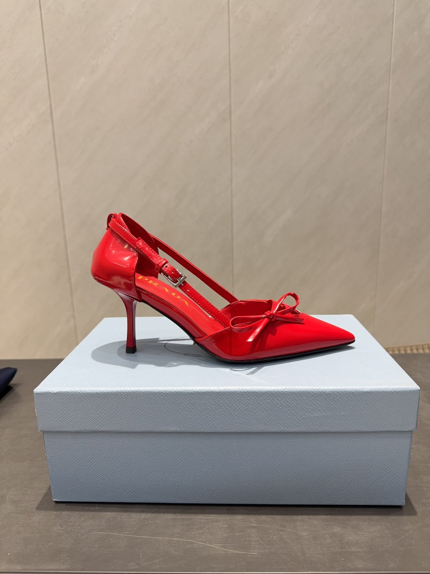 PRADA 26S POINTED TOE CUT OUT HIGH HEELS 75MM IN BRIGHT RED CALFSKIN WITH BOW
