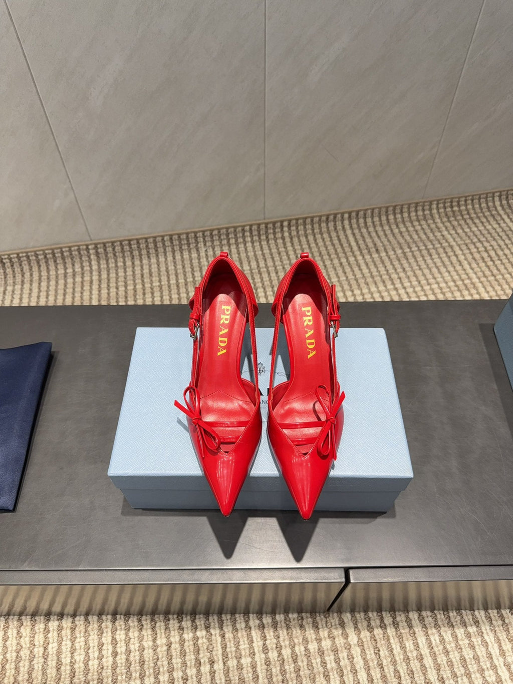 PRADA 26S POINTED TOE CUT OUT HIGH HEELS 75MM IN BRIGHT RED CALFSKIN WITH BOW