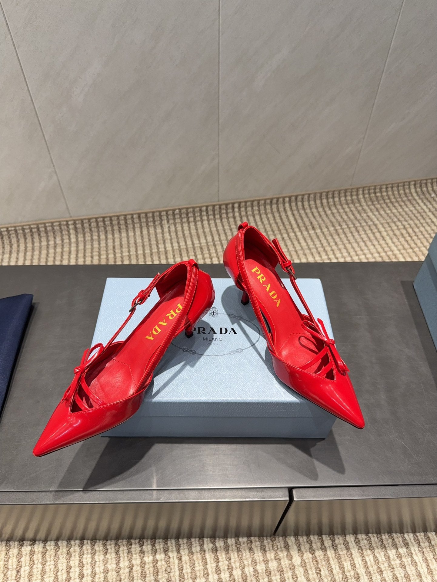 PRADA 26S POINTED TOE CUT OUT HIGH HEELS 75MM IN BRIGHT RED CALFSKIN WITH BOW