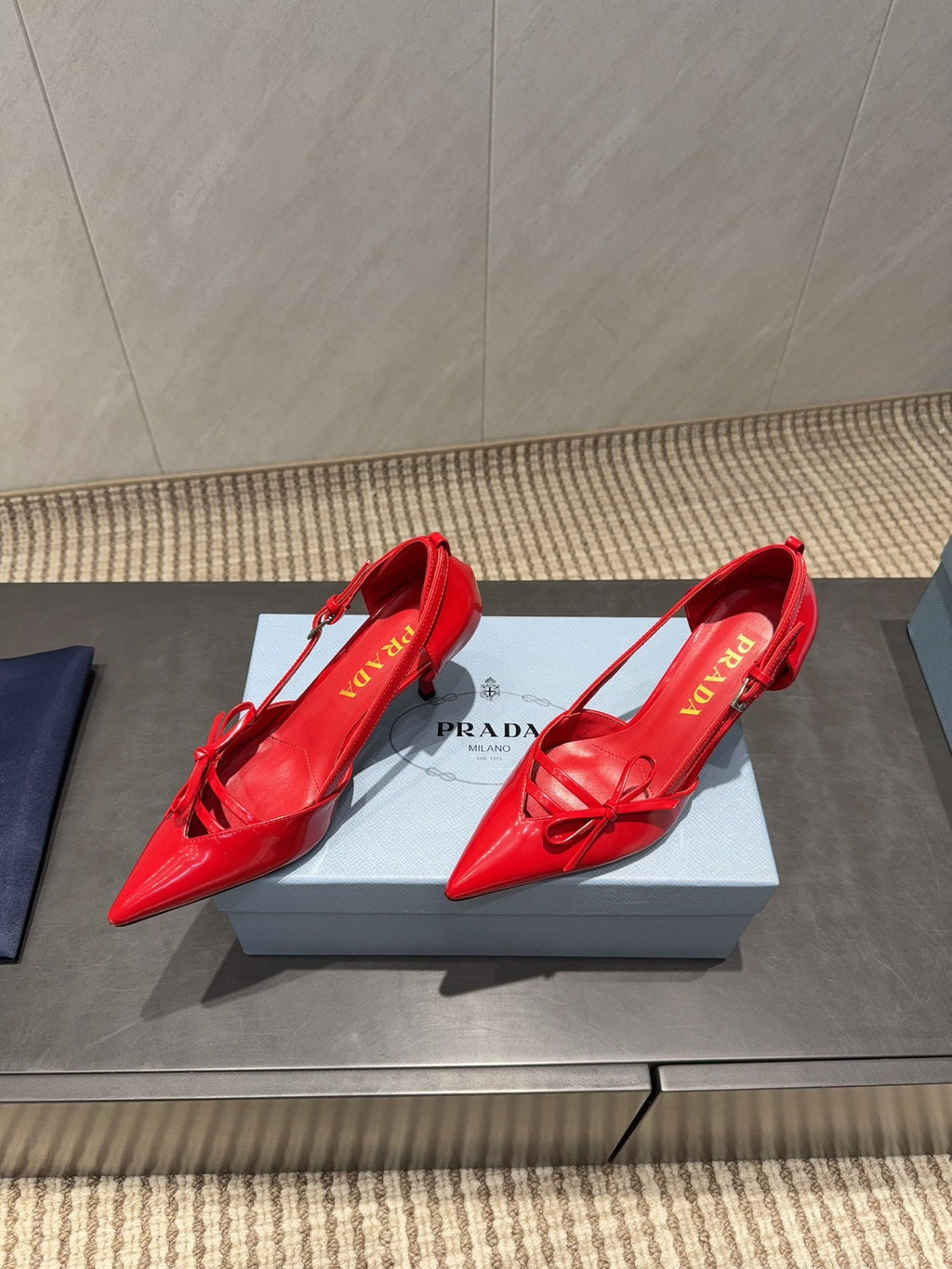 PRADA 26S POINTED TOE CUT OUT HIGH HEELS 75MM IN BRIGHT RED CALFSKIN WITH BOW