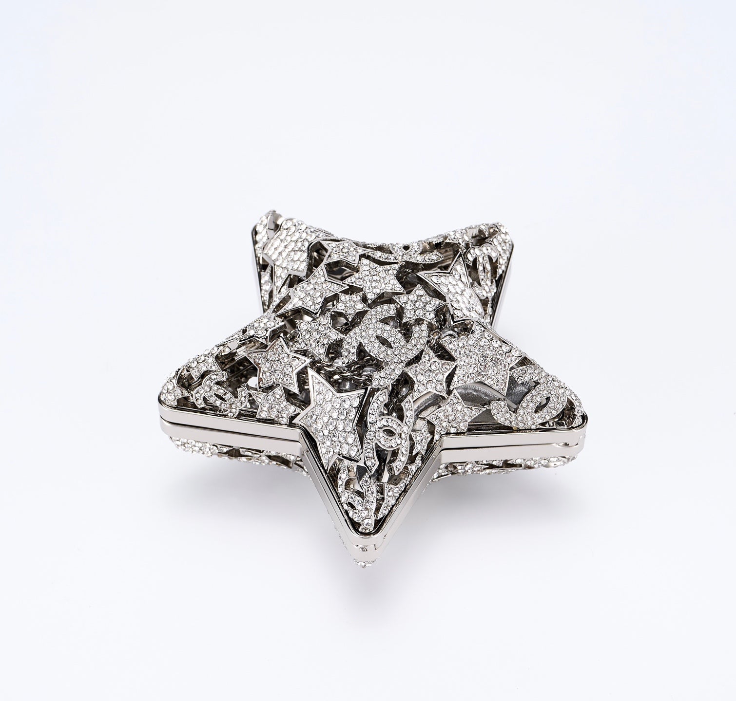 CHANEL 26S STAR CLUTCH MINI 13 IN SILVER CRYSTAL EMBELLISHED METAL
