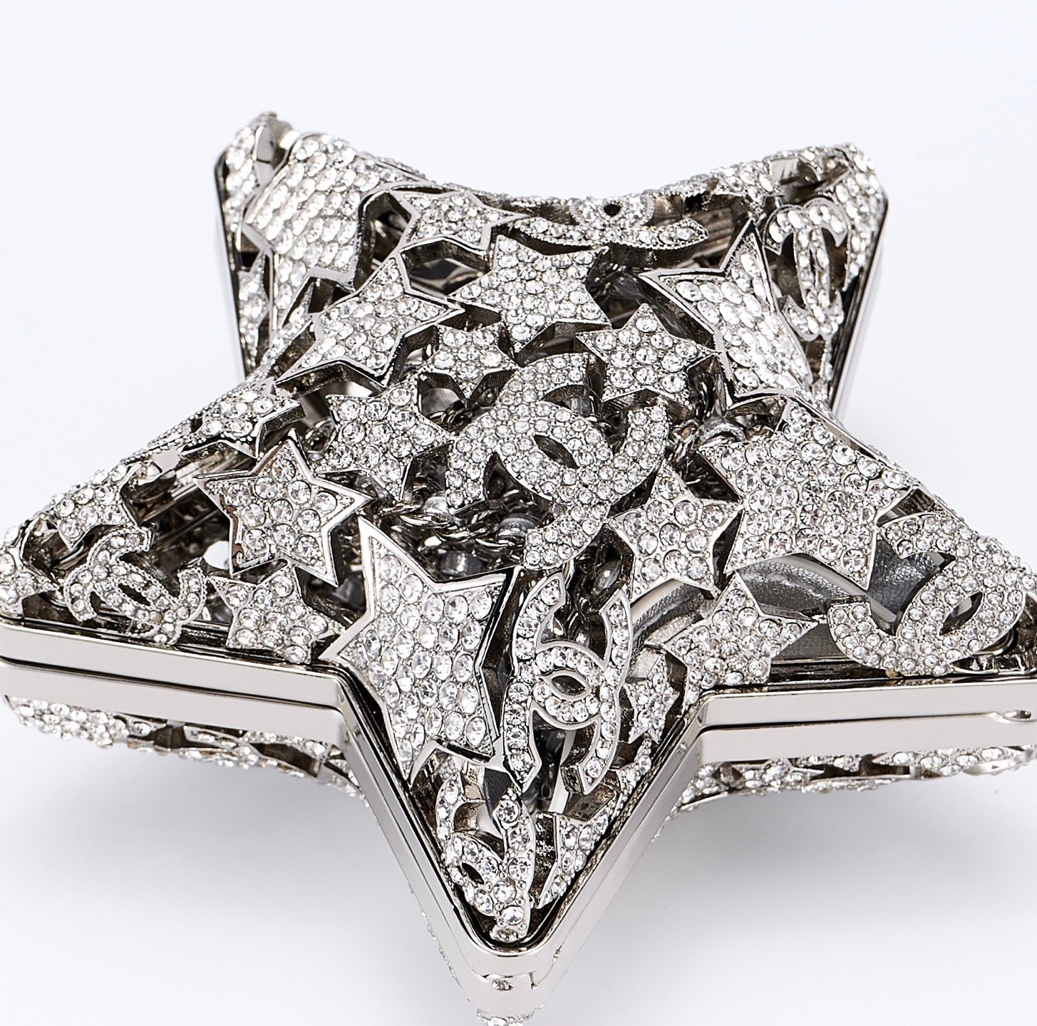 CHANEL 26S STAR CLUTCH MINI 13 IN SILVER CRYSTAL EMBELLISHED METAL