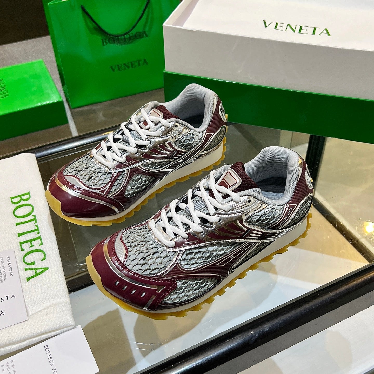 BOTTEGA VENETA 26S ORBIT SNEAKERS IN SILVER AND DARK RED TECHNICAL MESH