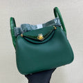 HM 25S MINI LINDY 19 CM IN DARK GREEN COWHIDE WITH CROCODILE HANDLE AND GOLD HARDWARE