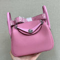 HM 25S MINI LINDY 19 CM IN PINK COWHIDE WITH CROCODILE HANDLE AND SILVER HARDWARE