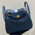 HM 25S MINI LINDY 19 CM IN MIDNIGHT BLUE COWHIDE WITH CROCODILE HANDLE AND GOLD HARDWARE