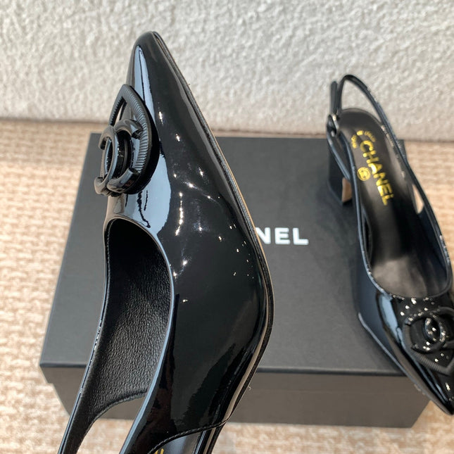 MID-HEEL SLINGBACKS IN BLACK PATENT CALFSKIN
