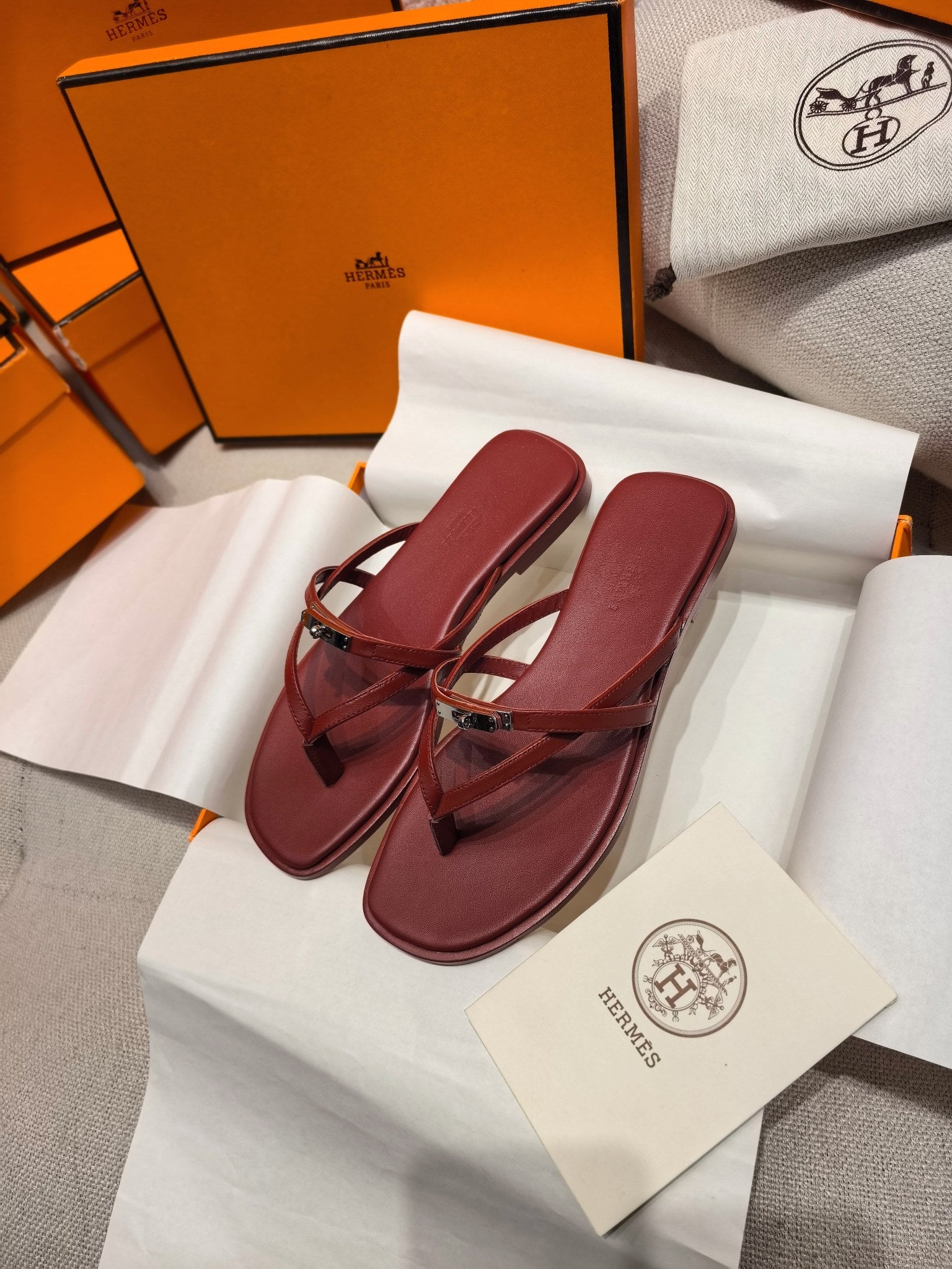 HM 26S KELLY BUCKLE THONG SANDALS IN DARK RED CALFSKIN SILVER HARDWARE