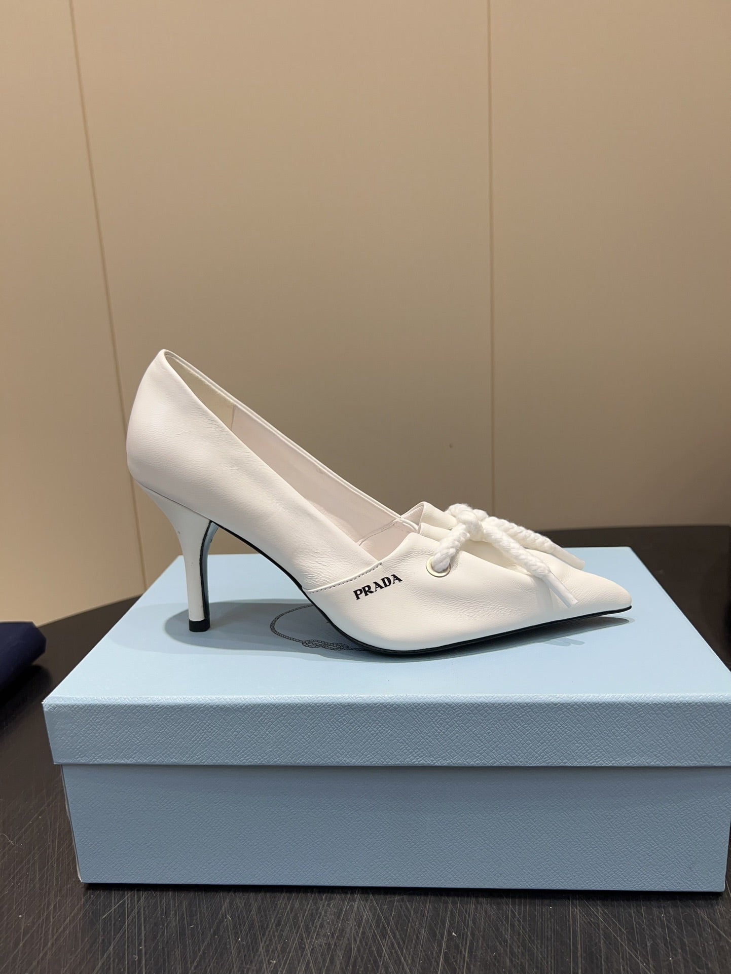 PRADA 25S POINTED TOE HIGH HEELS 85MM IN IVORY LAMBSKIN WITH TIE UP DESIGN