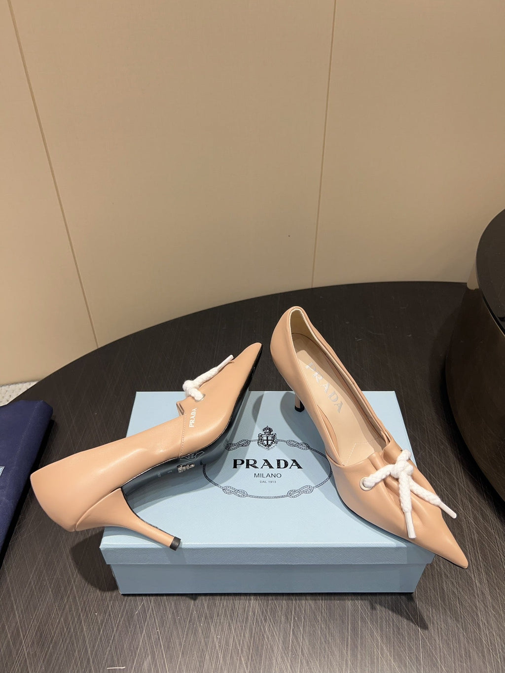 PRADA 25S POINTED TOE HIGH HEELS 85MM IN BEIGE LAMBSKIN WITH TIE UP DESIGN