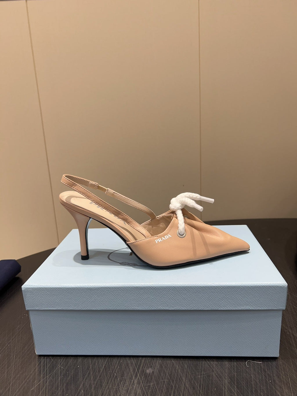 PRADA 25S POINTED TOE SLINGBACK 85MM IN BEIGE LAMBSKIN WITH TIE UP DESIGN