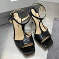 HIGH-HEELED T-STRAP SANDAL IN BLACK CALFSKIN