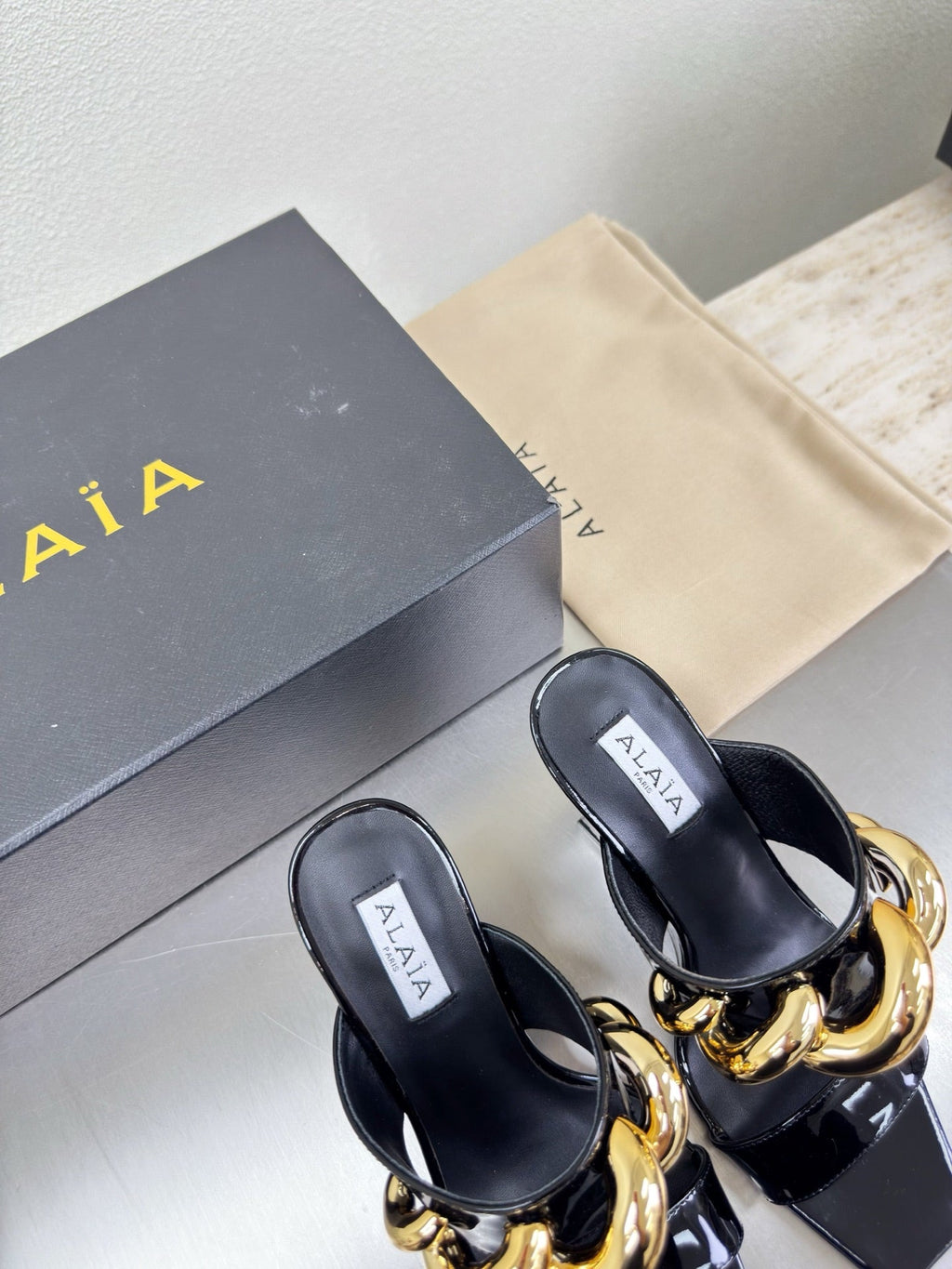 ALAIA 26S DOUBLE STRAP WEDGE SANDALS 110 MM IN BLACK GLOSSY CALFSKIN WITH GOLD HARDWARE