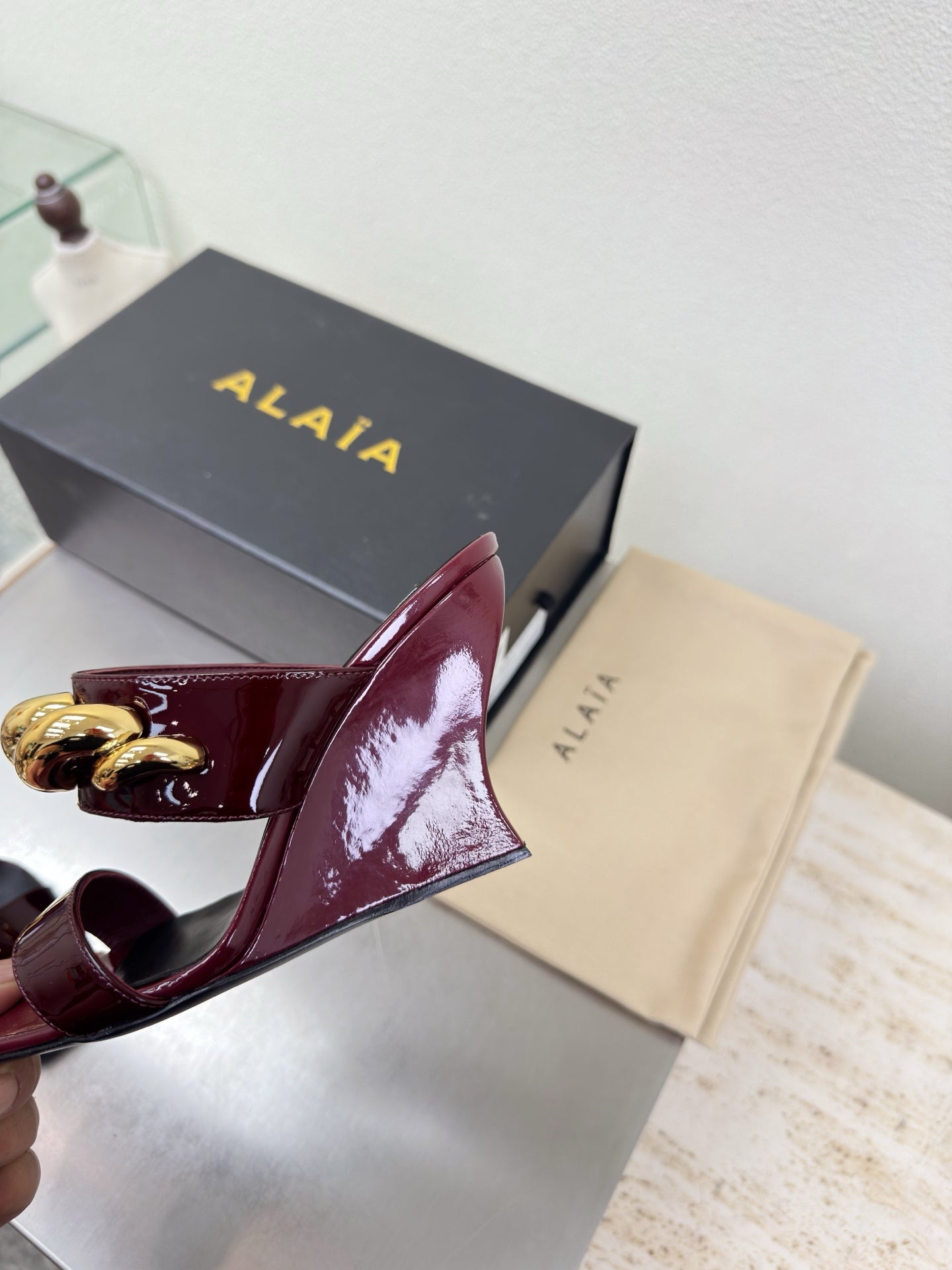 ALAIA 26S DOUBLE STRAP WEDGE SANDALS 110 MM IN DARK RED GLOSSY CALFSKIN WITH GOLD HARDWARE