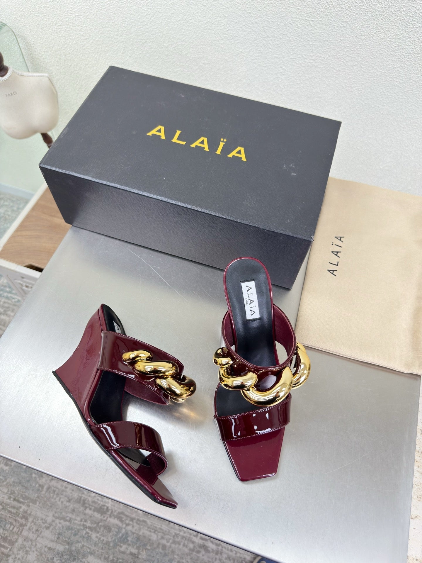 ALAIA 26S DOUBLE STRAP WEDGE SANDALS 110 MM IN DARK RED GLOSSY CALFSKIN WITH GOLD HARDWARE