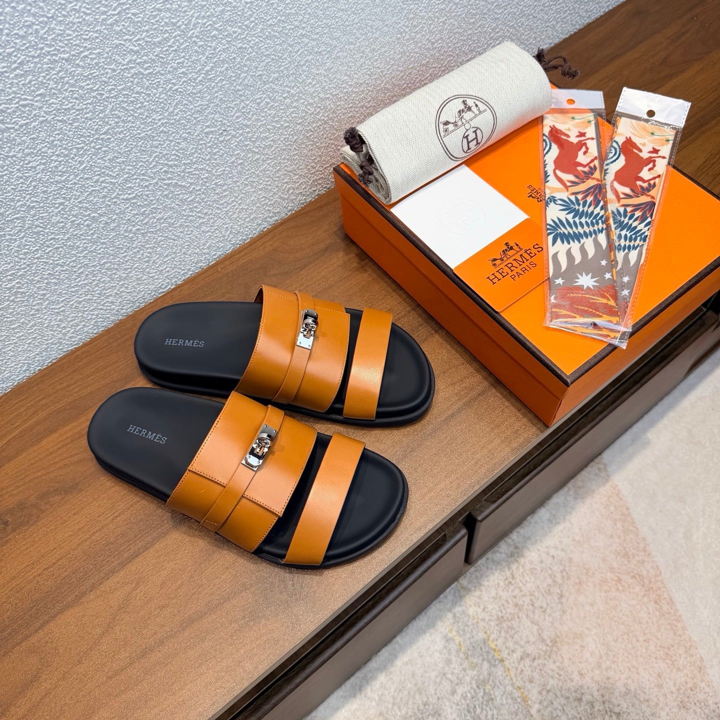 HM 26S KELLY BUCKLE DOUBLE STRAP SANDALS IN BURNT ORANGE CALFSKIN