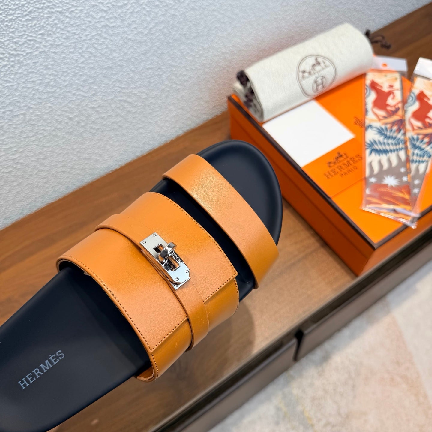 HM 26S KELLY BUCKLE DOUBLE STRAP SANDALS IN BURNT ORANGE CALFSKIN