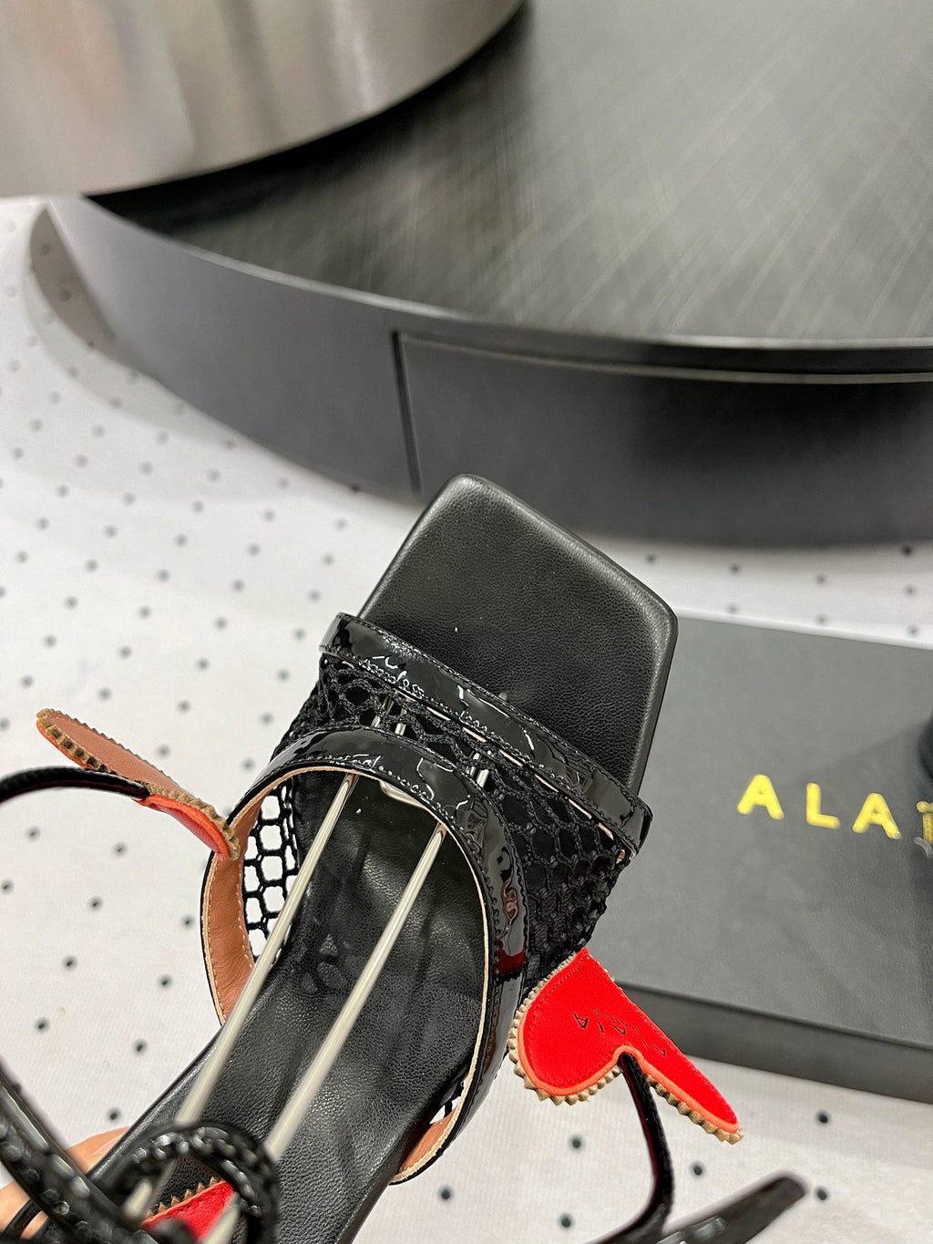 ALAIA BANQUET WEDGE SANDALS IN BLACK LAMBSKIN WITH RED HEART