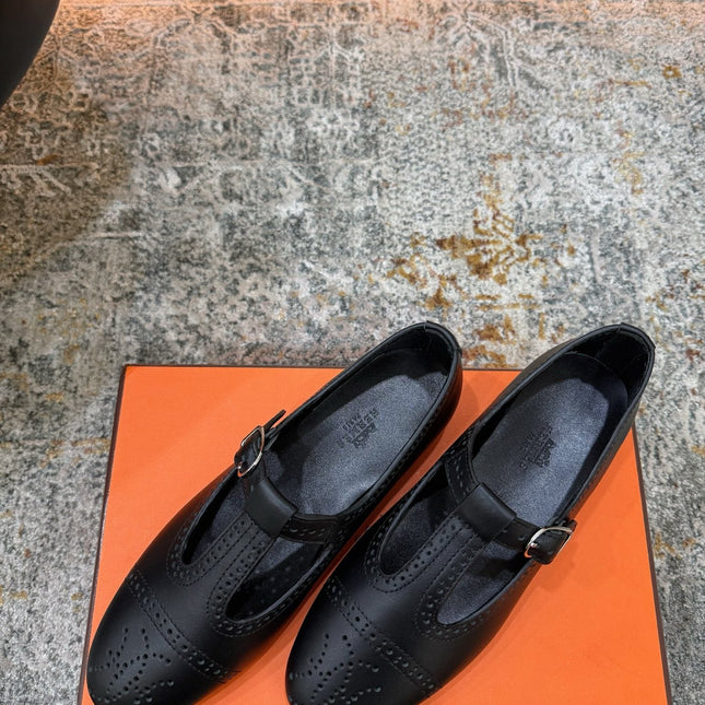 HM 26S PERFORATED BALLET FLATS IN BLACK CALFSKIN