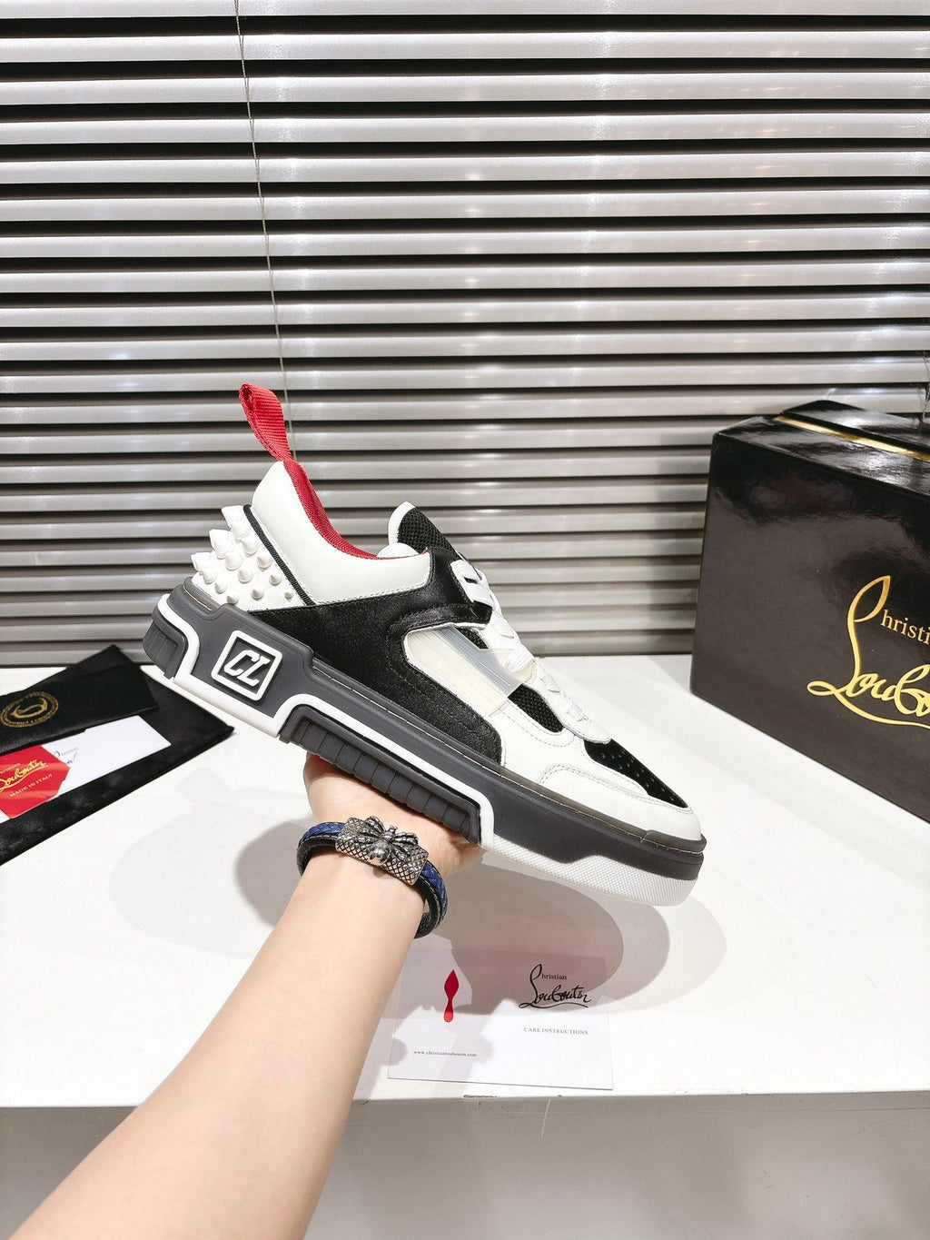 CL SNEAKER IN BLACK AND WHITE CALFSKIN 323158