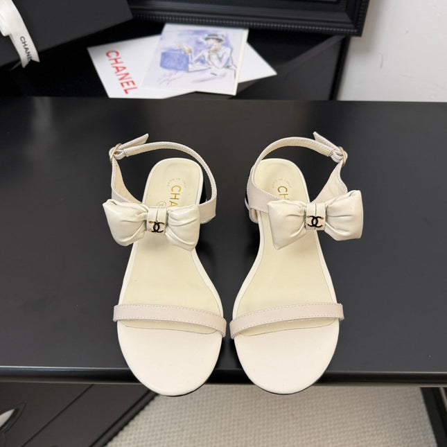 FLAT SANDALS IN WHITE CALFSKIN WITH BOW