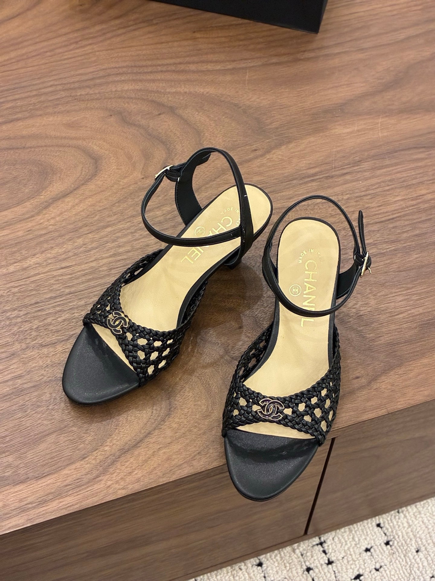 CHANEL 26S HIGH-HEELED BACK-STRAP SANDALS 60 MM IN BLACK WOVEN LAMBSKIN