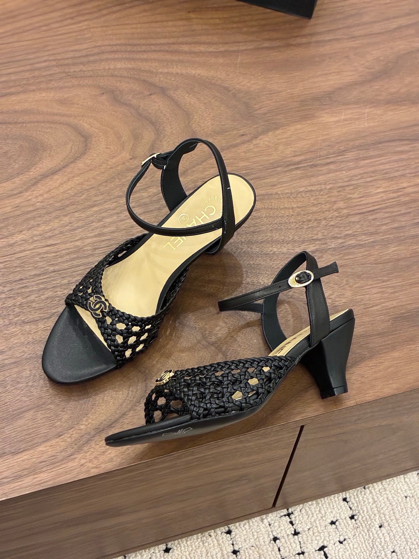 CHANEL 26S HIGH-HEELED BACK-STRAP SANDALS 60 MM IN BLACK WOVEN LAMBSKIN