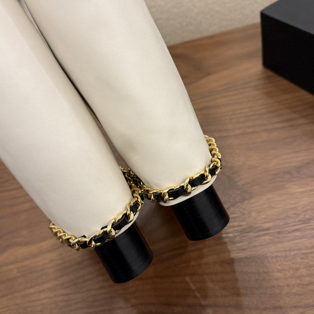 CHANEL 26S TALL BOOTS 60 MM IN WHITE CALFSKIN TALL BOOTS WITH GOLD TONE CHAIN DETAIL