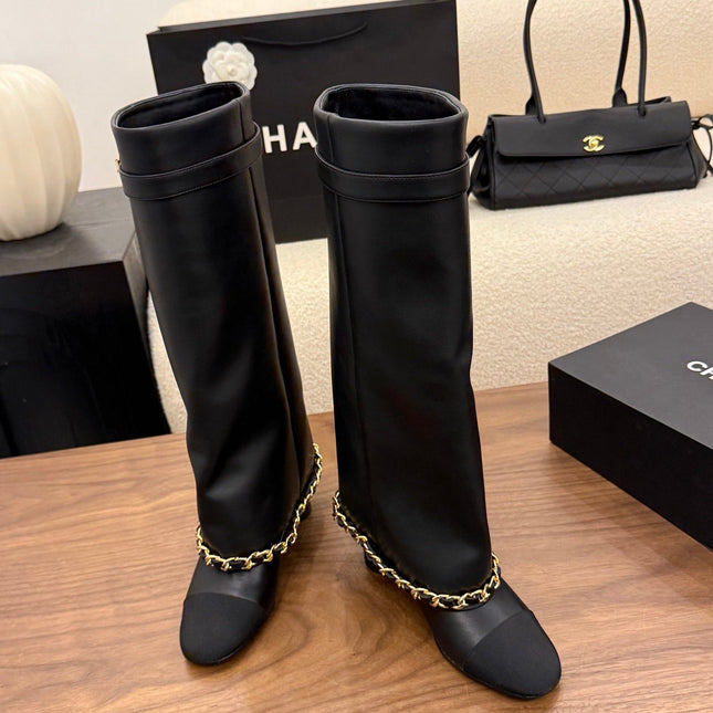 CHANEL 26S TALL BOOTS 60 MM IN BLACK CALFSKIN TALL BOOTS WITH GOLD TONE CHAIN DETAIL