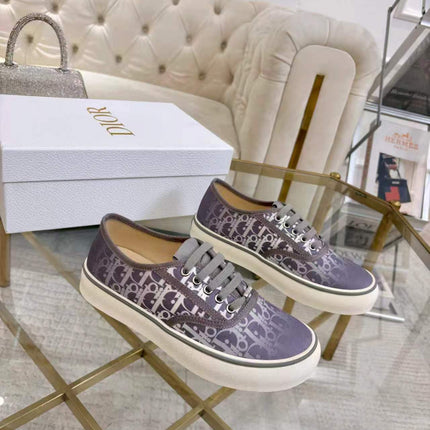 DIOR 26S LOW-TOP SNEAKERS IN LIGHT PURPLE DIOR OBLIQUE CANVAS