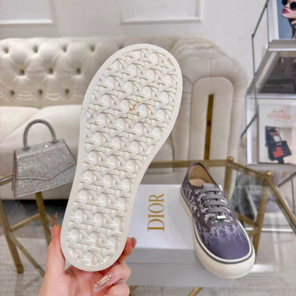 DIOR 26S LOW-TOP SNEAKERS IN LIGHT PURPLE DIOR OBLIQUE CANVAS